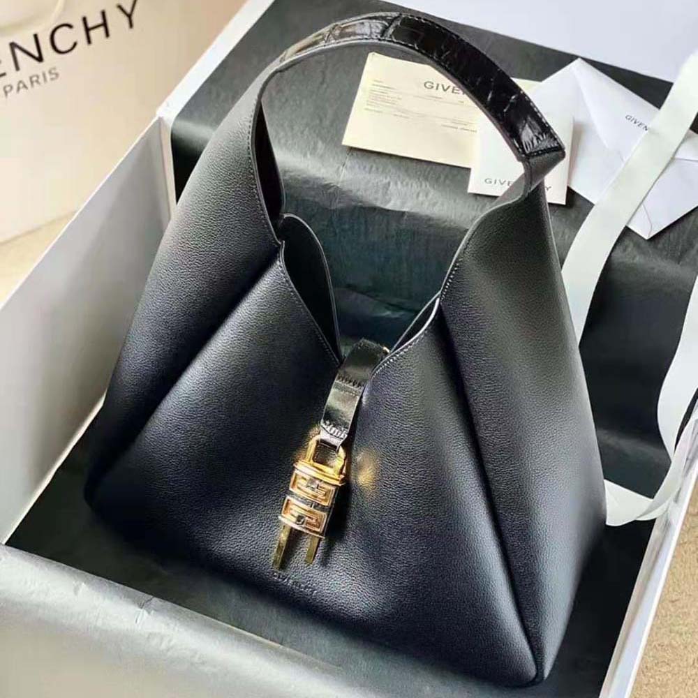 Close-up of signature G-shaped silver hardware on Givenchy Women Medium G-Hobo Bag