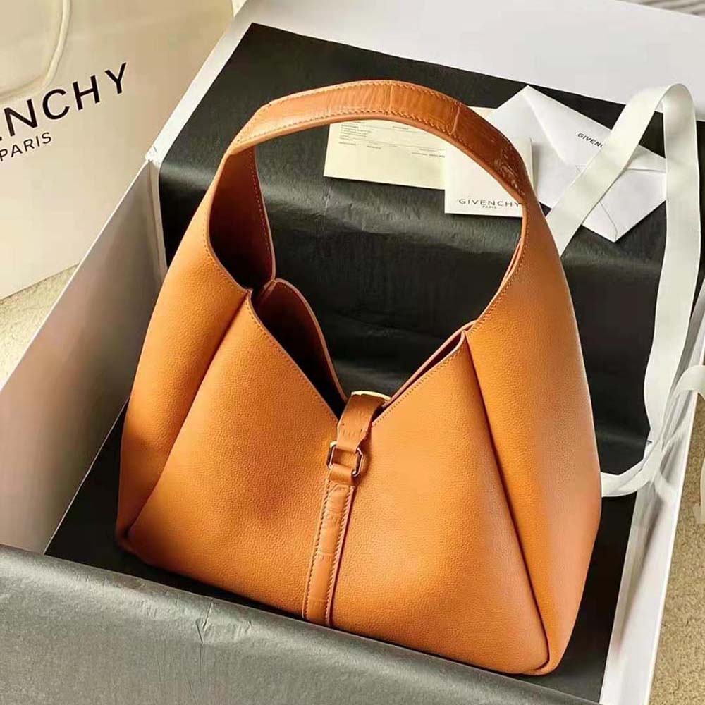 Side profile showing silhouette of Givenchy Women Medium G-Hobo Bag brown