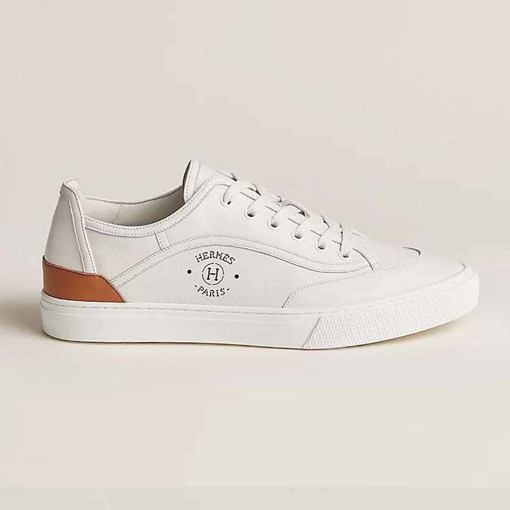 Side view of Hermes Unisex Get Sneaker in white calfskin