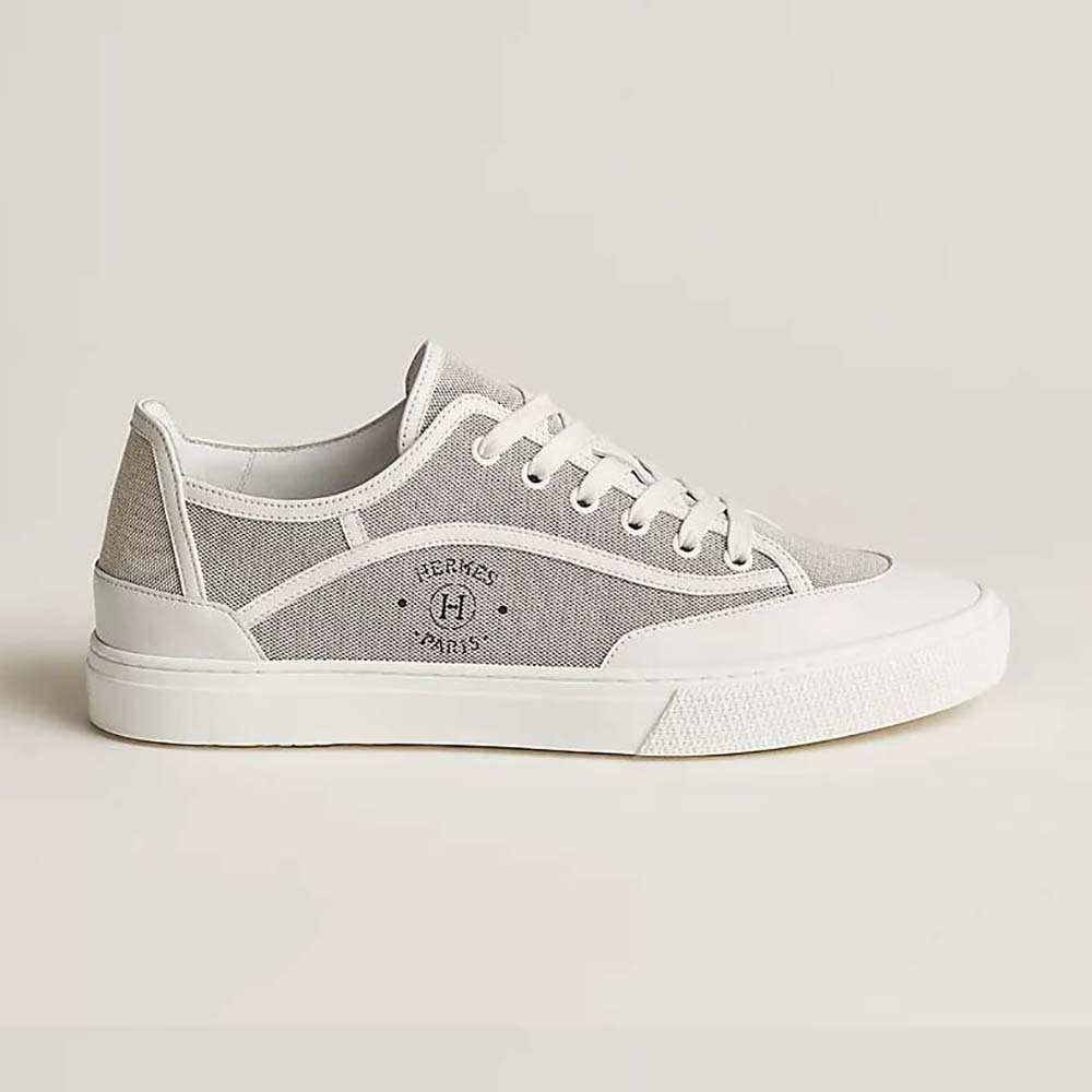Side profile of Hermes Unisex Get Sneaker in silver canvas and calfskin