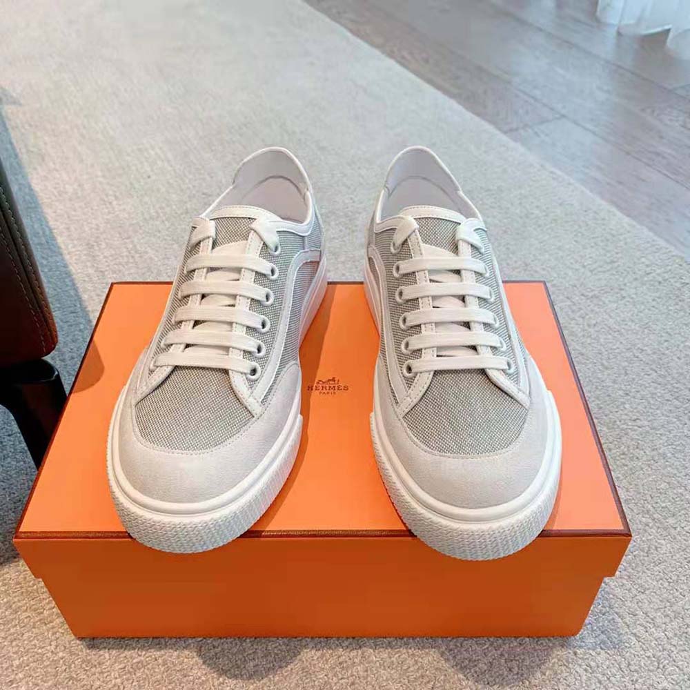 Close-up of lace and Hermès Paris stencil on Get Sneaker upper