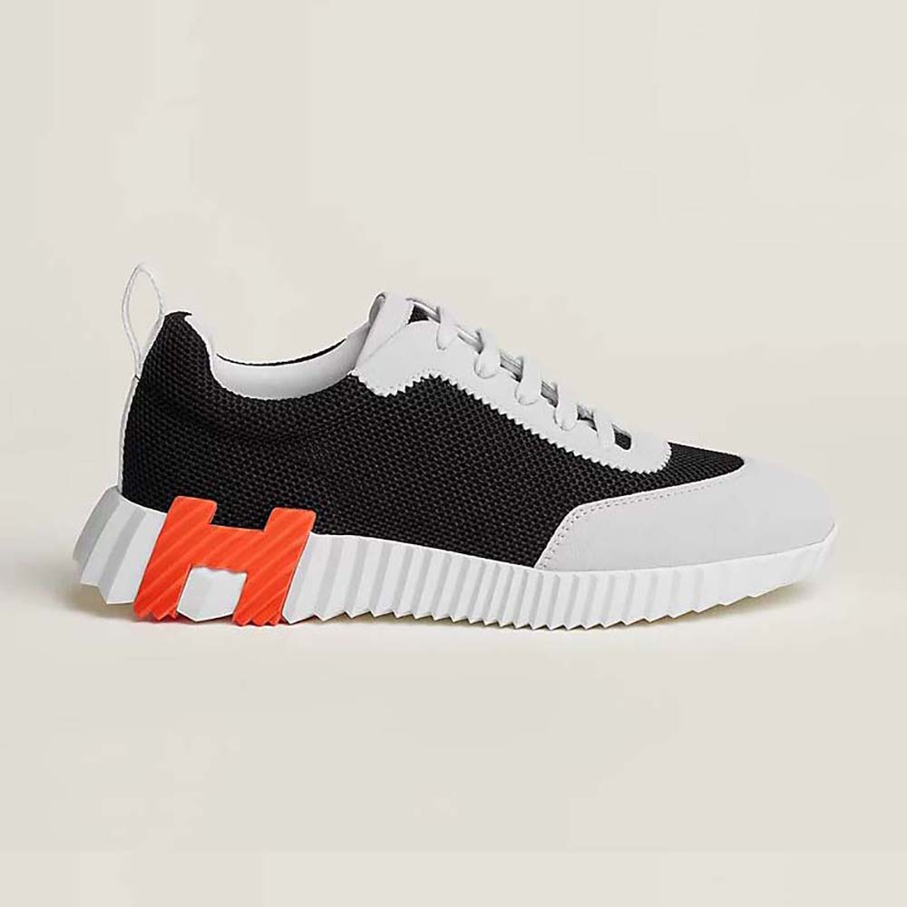 Side profile of Hermes Women Bouncing Sneaker in black suede and mesh