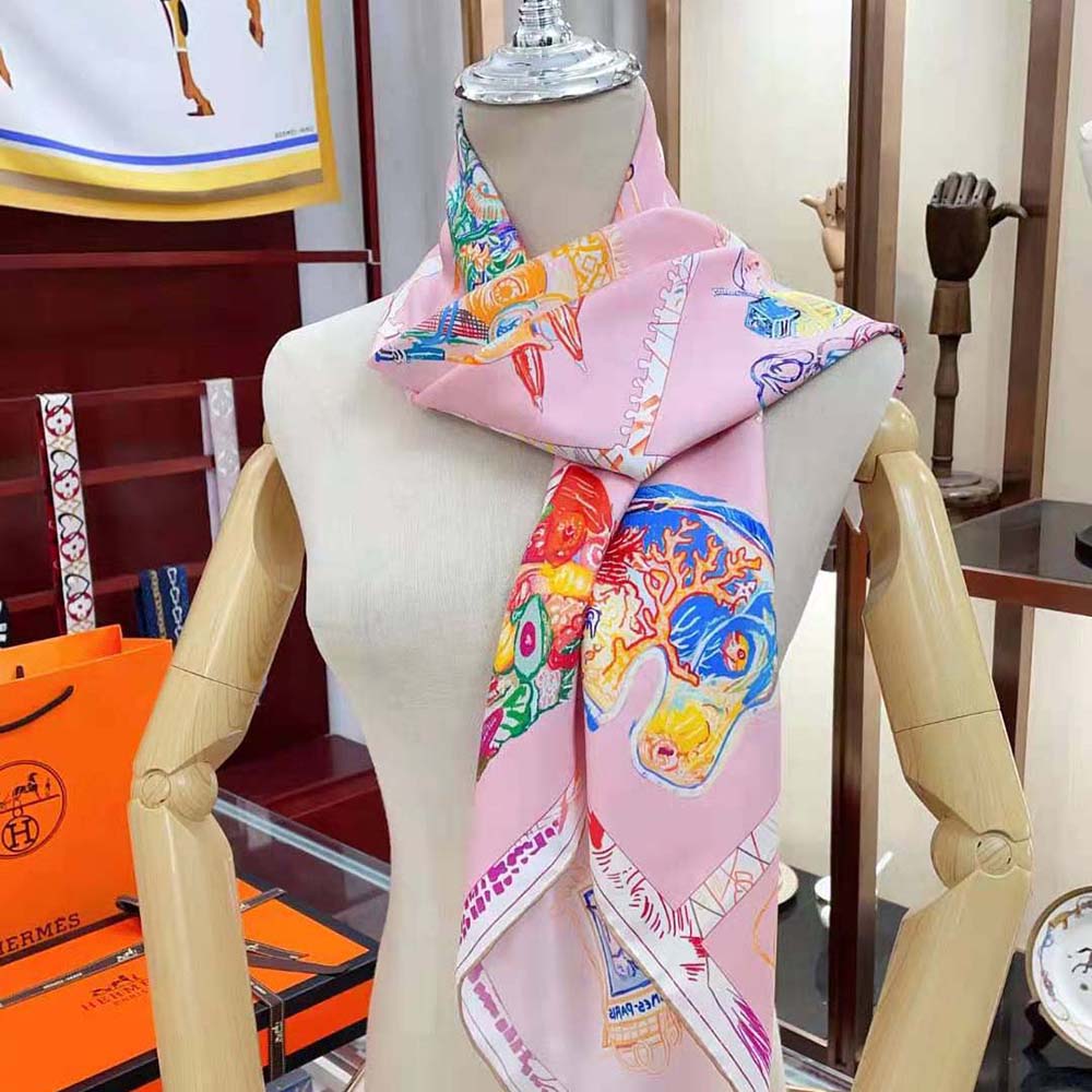 Close-up detail of hand-rolled edges on Hermes Women Chevaloscope Scarf Pink