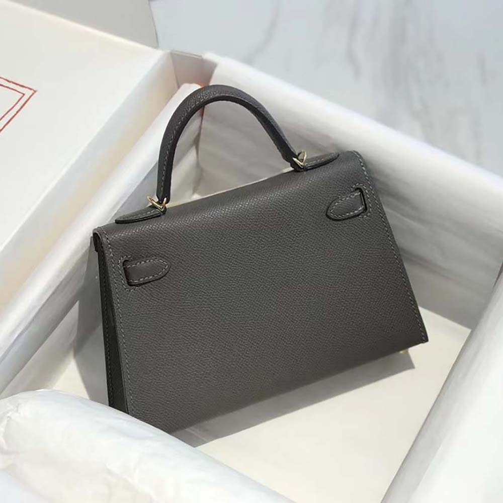 Side angle showing structured silhouette of Hermes Women Kelly Bag 20