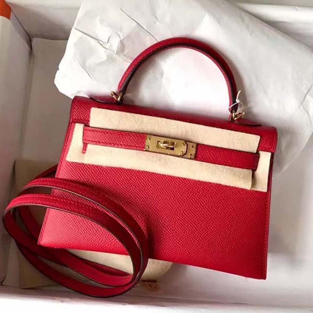 Front angle of Hermes Women Kelly Bag 20 in vibrant red Epsom leather