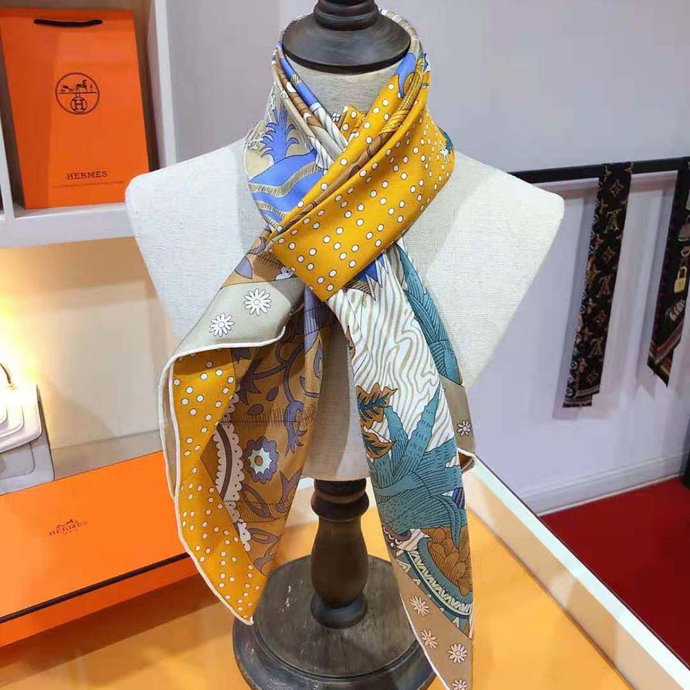 Detail shot showing texture and color of Hermes Women Le Premier Chant Scarf 90 silk