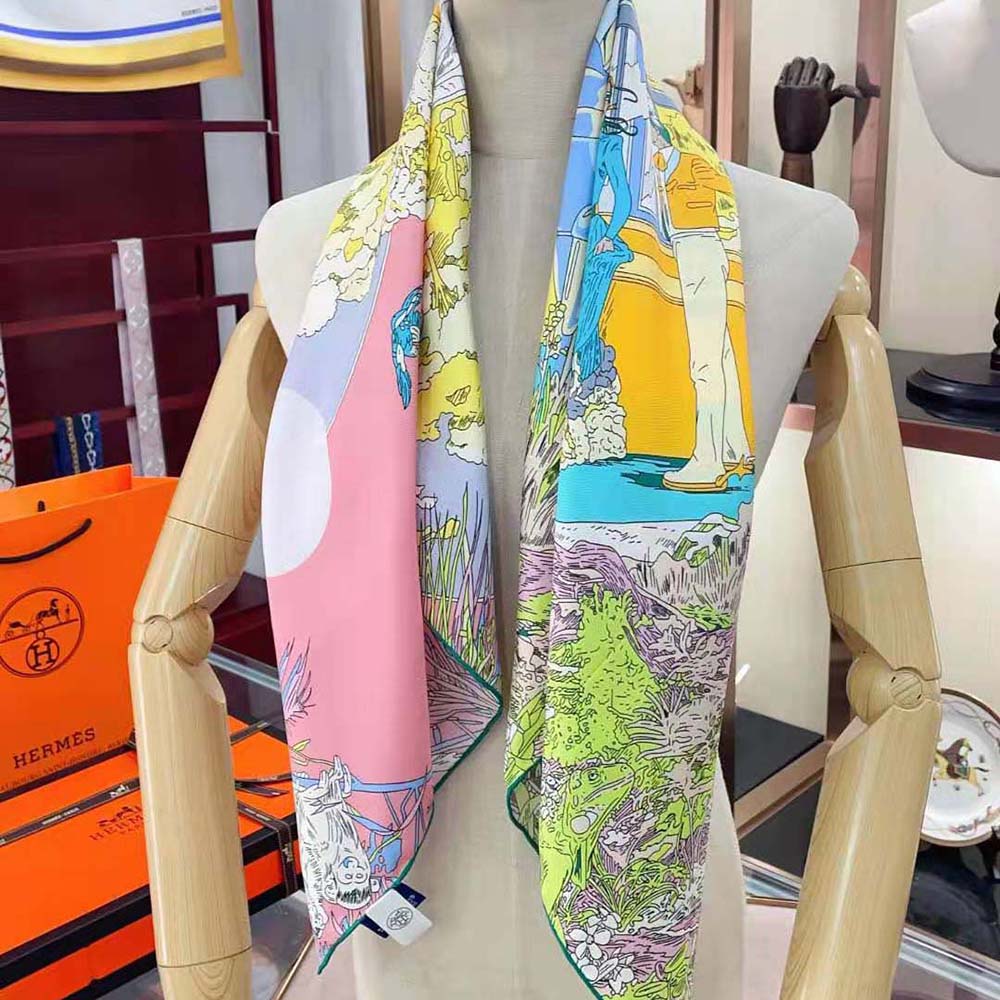 Styling detail showing pink Hermes Women Rendez-Vous Galant Scarf 70 tied on handbag
