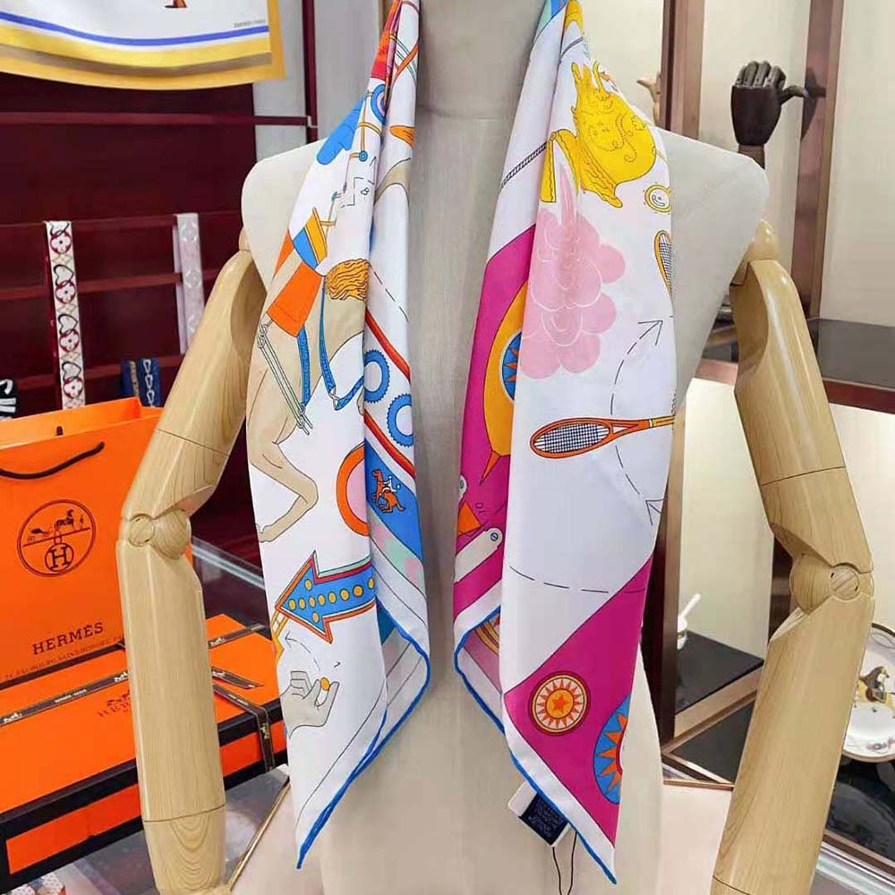 Model wearing Hermes Women Tea for Two Scarf 90 tied around the neck