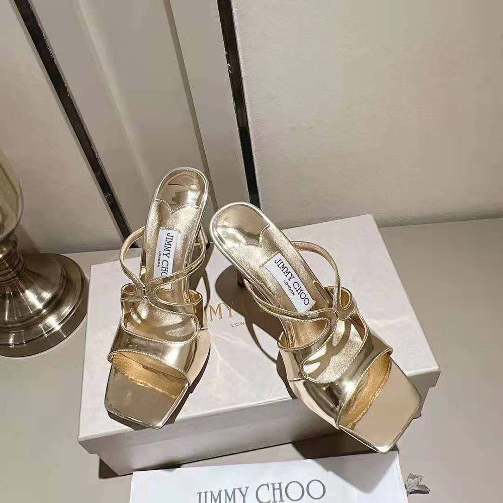 Close-up of gold buckle detail on Jimmy Choo Anise 95 mules