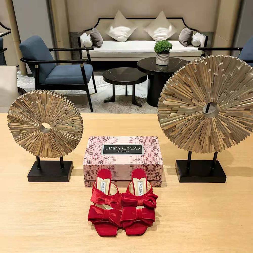 Close-up on red velvet bow detail of Jimmy Choo Women Flaca Sandal 100