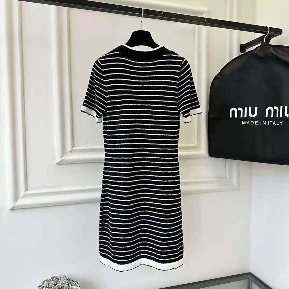 Side angle showing silhouette of Miu Miu Women Bouclé Cotton Crew-Neck Mini-Dress