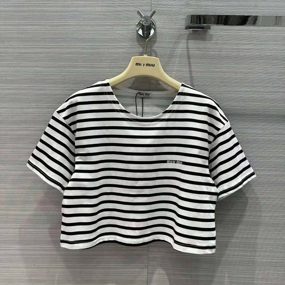 Close-up of printed logo on black cotton fabric of Miu Miu Women T-shirt