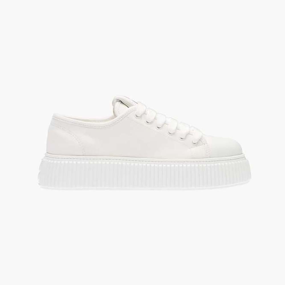 Side angle of Miu Miu Women Denim Sneakers EVA Sole with Logo-White showing lace-up detail