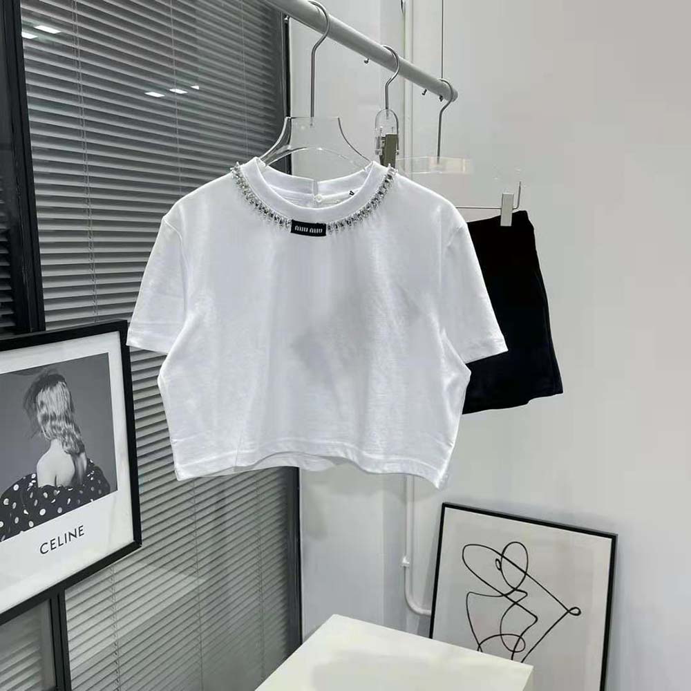 Close-up of embroidered logo patch on Miu Miu Women Cotton T-shirt
