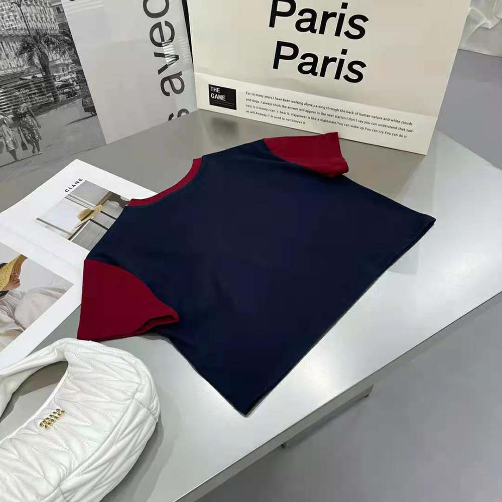 Side angle showing relaxed fit of Miu Miu Women Jersey T-shirt Navy