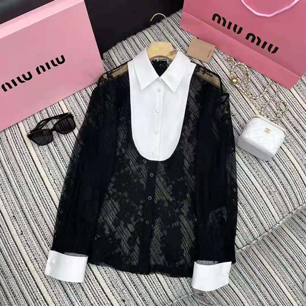 Close-up of knit logo label on black lace shirt by Miu Miu