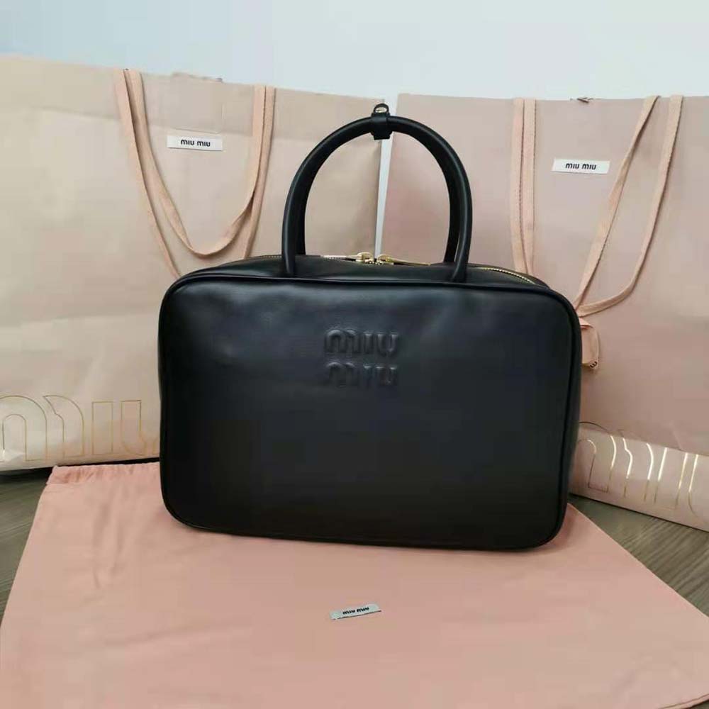 Close-up of silver-tone hardware detail on Miu Miu Women Leather Top-Handle Bag-Black