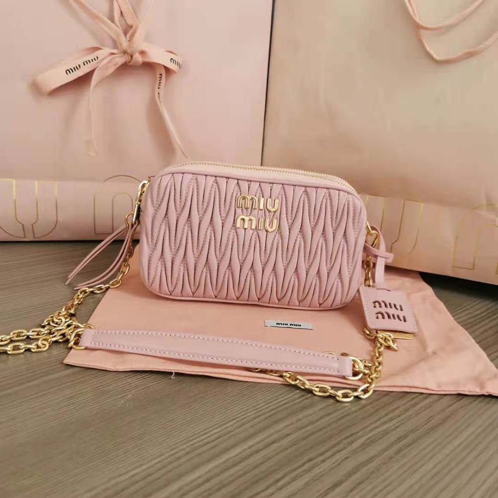 Close-up of pink quilted nappa leather texture on Miu Miu mini-bag