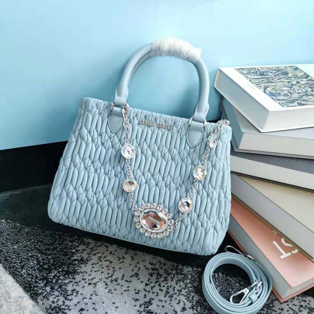Close-up of crystal detailing on Miu Miu Women Miu Crystal Cloqué Nappa Leather Handbag-Blue
