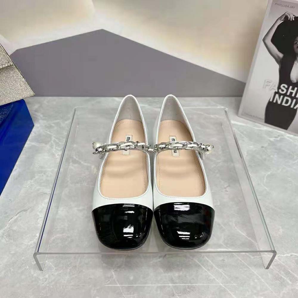 Top-down angle of Miu Miu Women Patent Leather Ballerinas-White classic silhouette