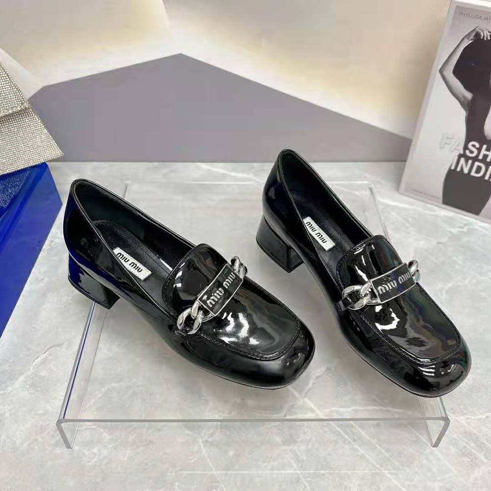 Side profile showing 35 mm heel on Miu Miu Women Patent Leather Loafers