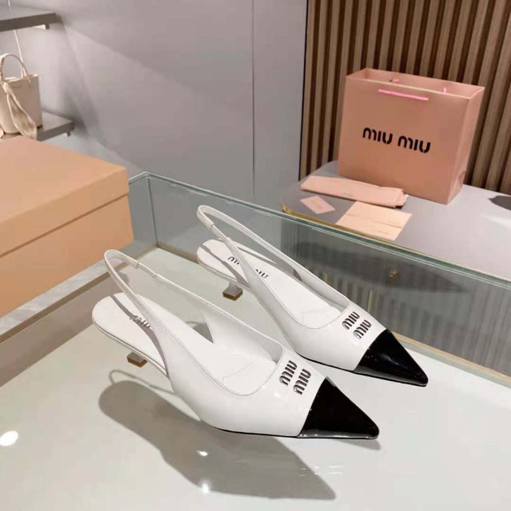 Close-up of glossy white patent leather on Miu Miu Women Patent Leather Pump
