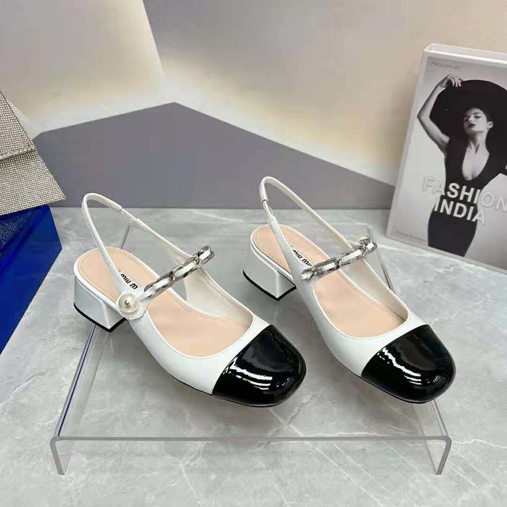 Top angle showing sleek silhouette of Miu Miu Women Patent Leather Pumps