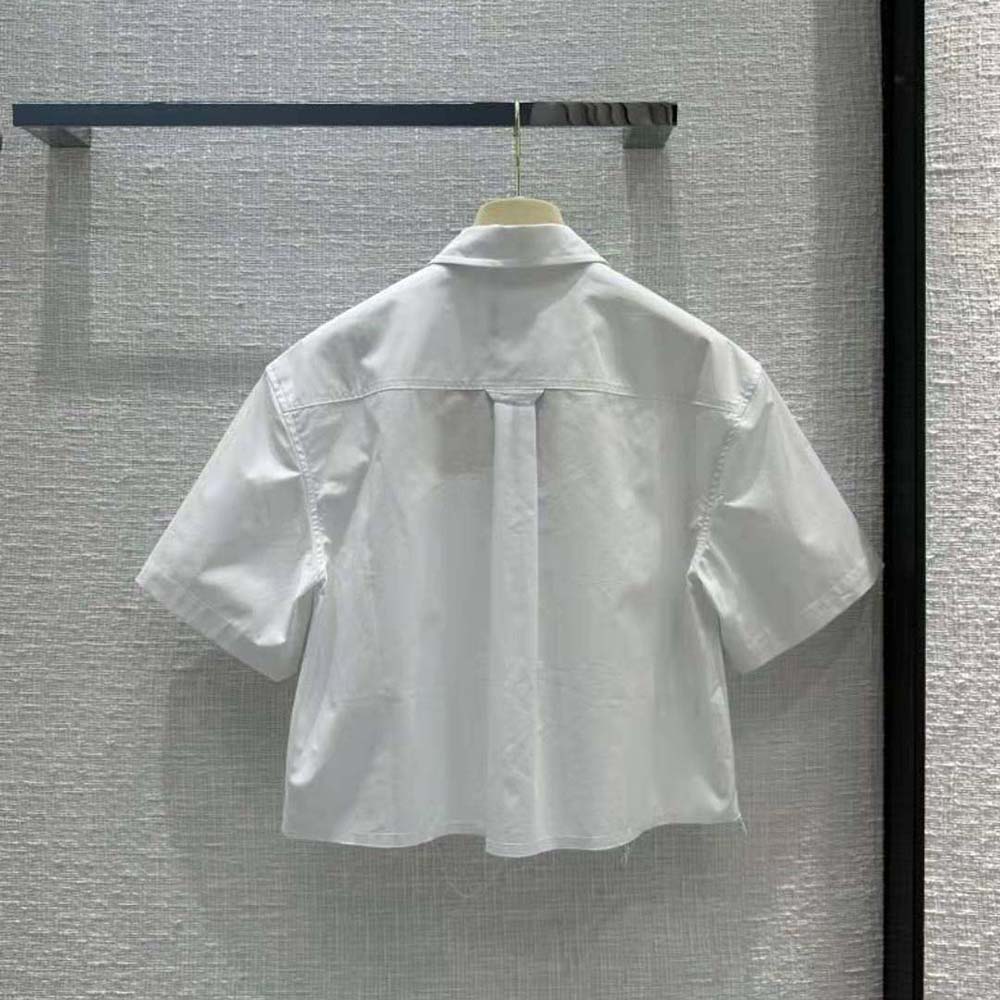 Side profile showing silhouette of Miu Miu Women Poplin Shirt white