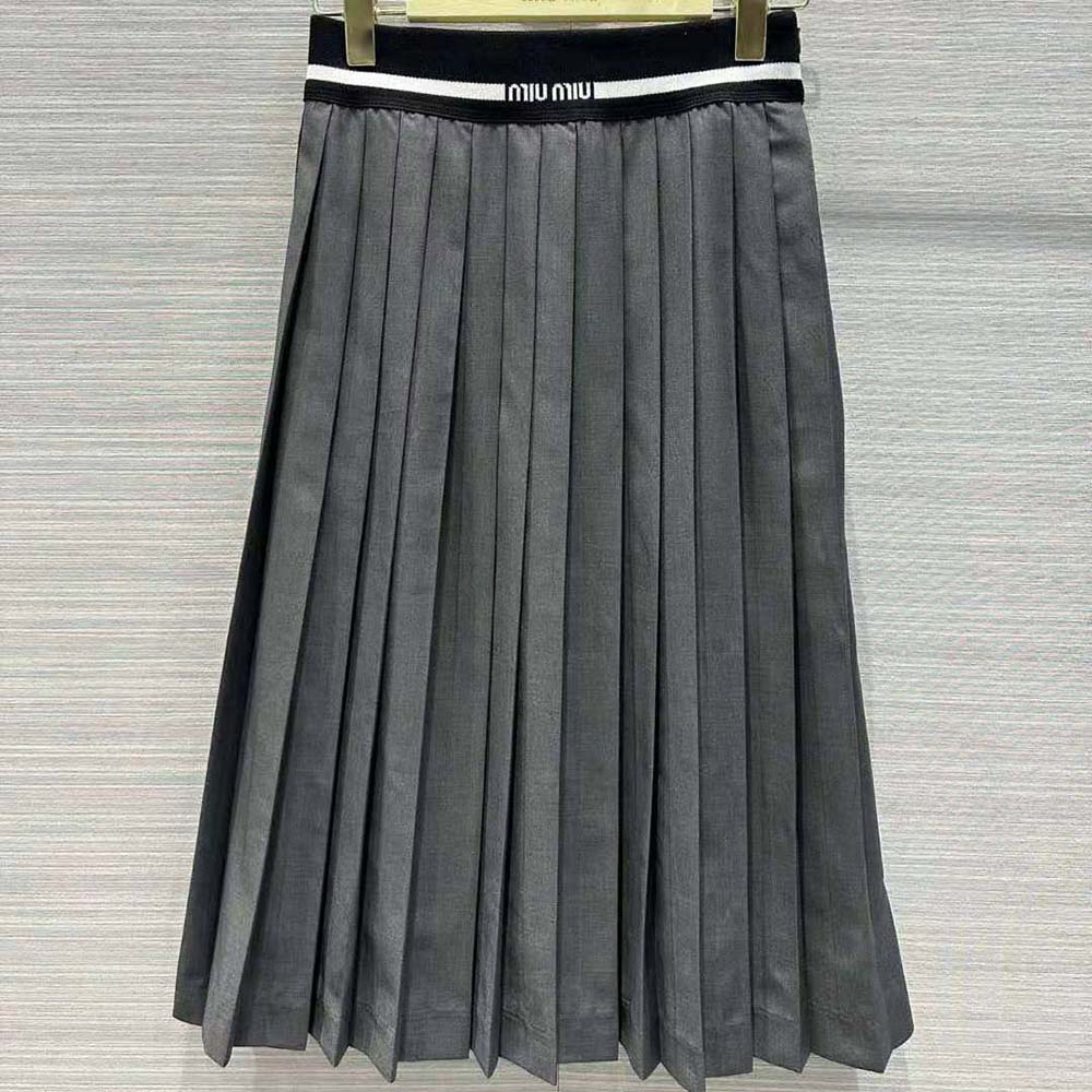 Close-up of knit waistband and embroidered logo on Miu Miu Women Prince of Wales Check Skirt