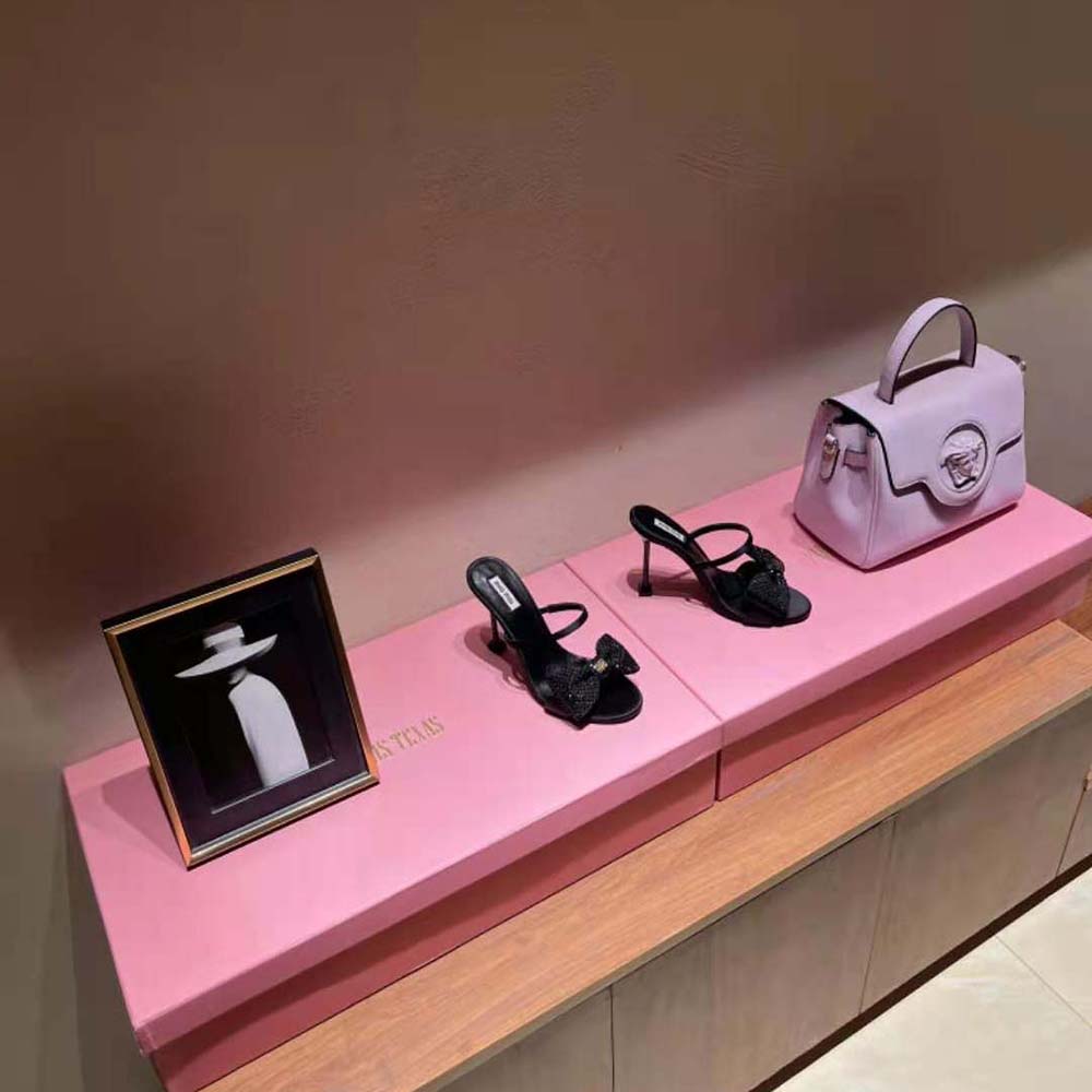 Close-up of oversized satin bow detail on Miu Miu Women Satin Bow Sandals