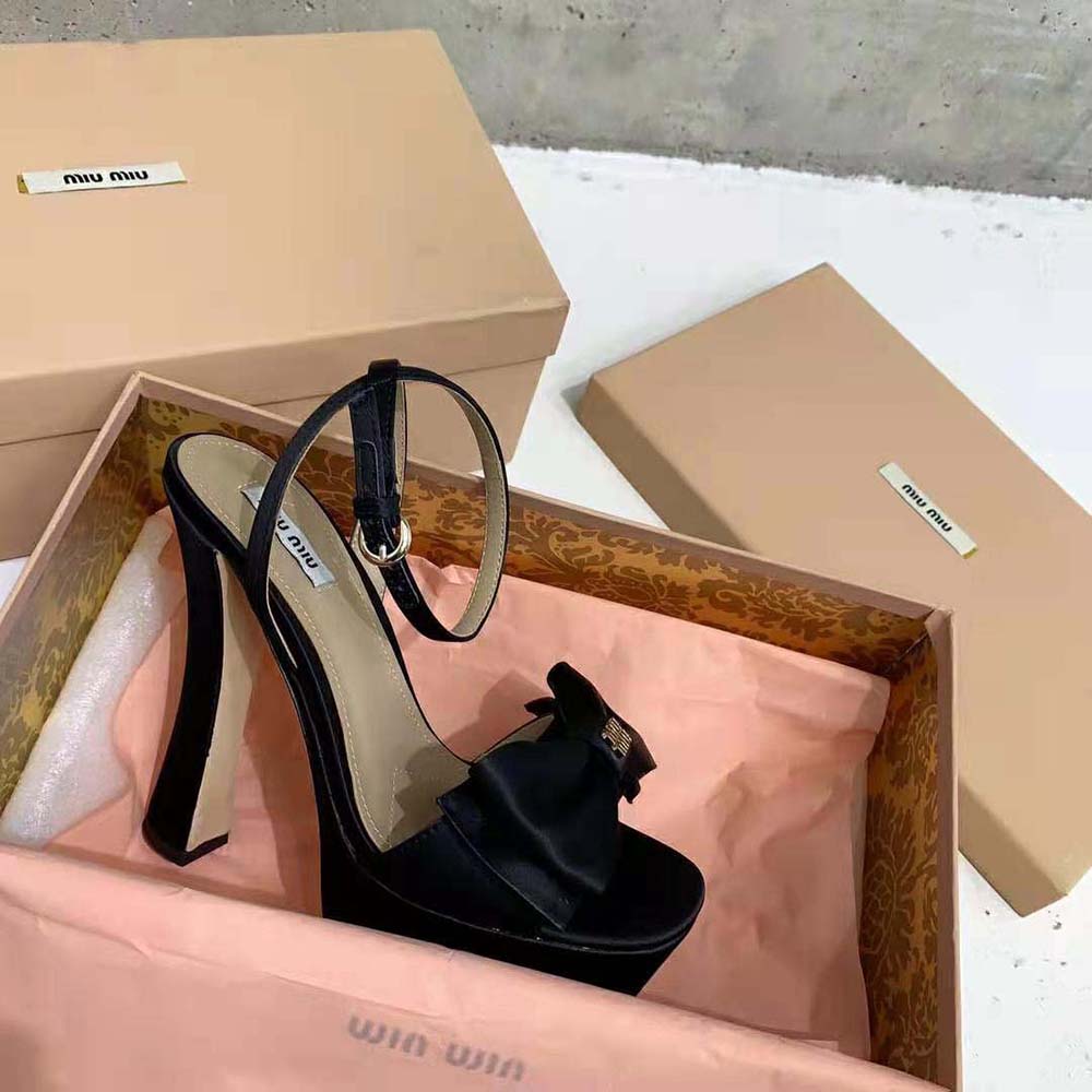 Front angle showing platform and heel height of Miu Miu Women Satin Platform Sandals