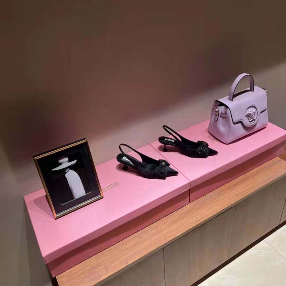 Elegant silhouette of Miu Miu Women Satin Slingback Pumps, heel focus