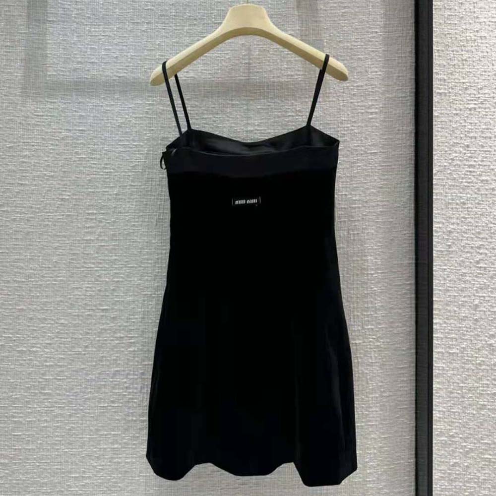 Side angle highlighting silhouette of Miu Miu Women Velvet Short Dress