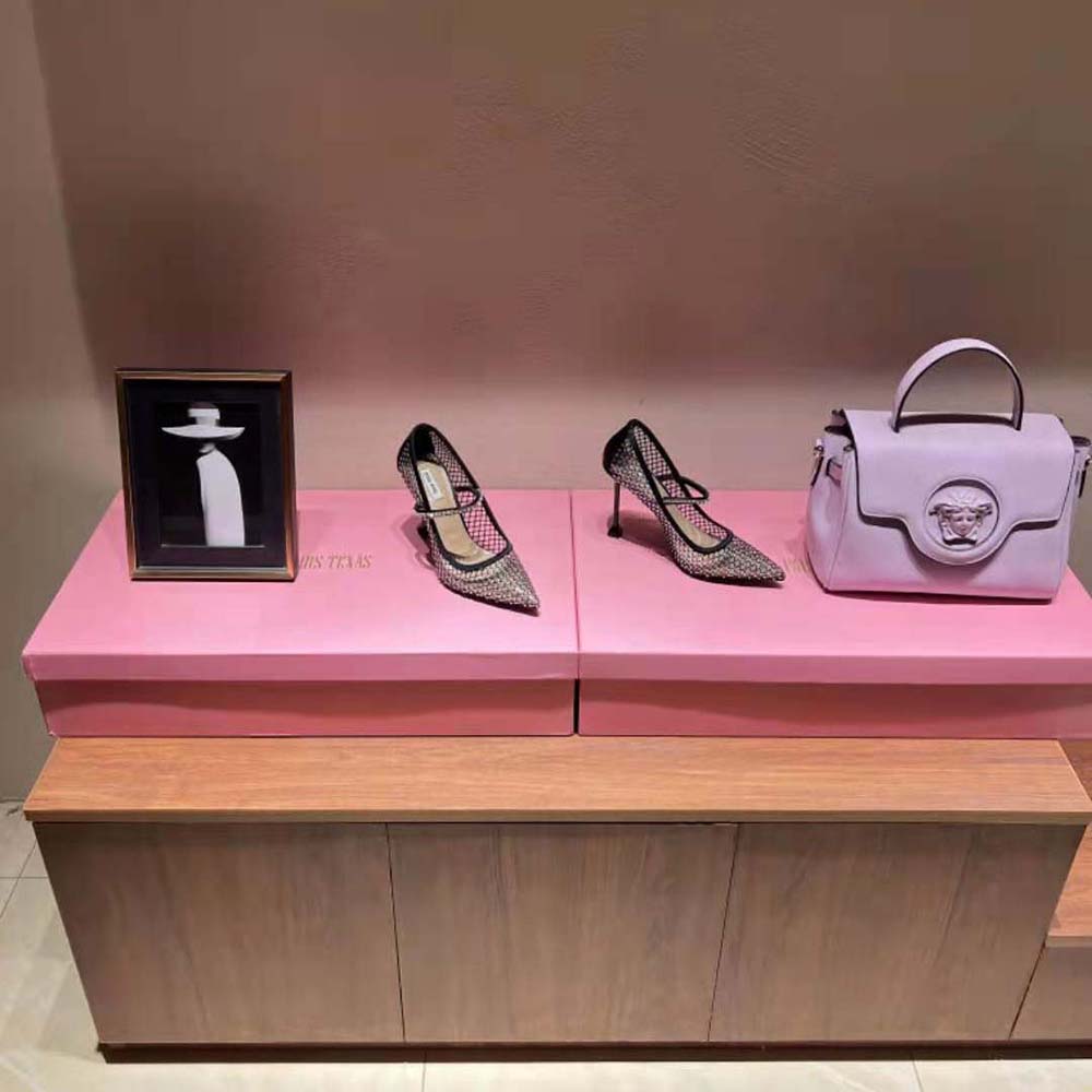 Side view showing 105 mm heel of Miu Miu Women Vinyl and Mesh Pumps
