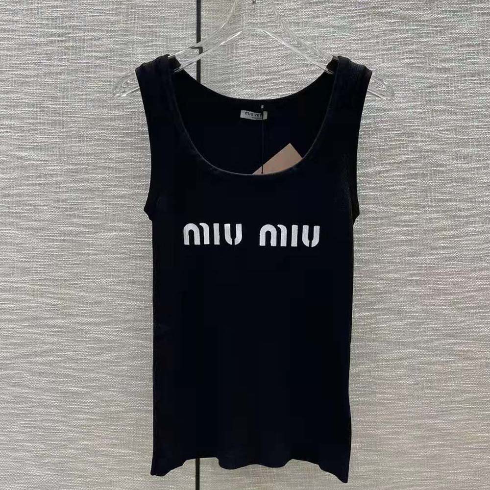 Close-up detail showing intarsia logo on black viscose tank top