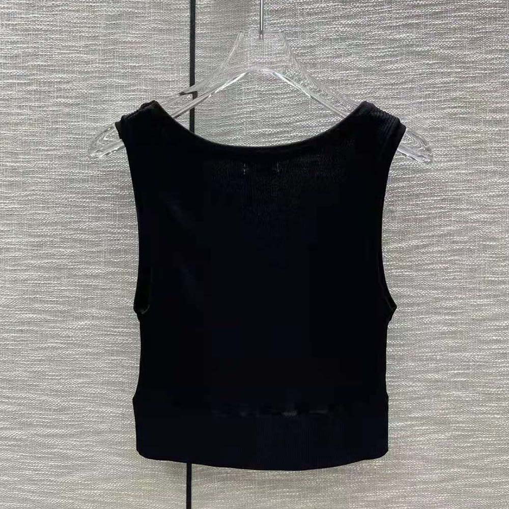 Side angle showing relaxed fit of Miu Miu viscose black T-shirt