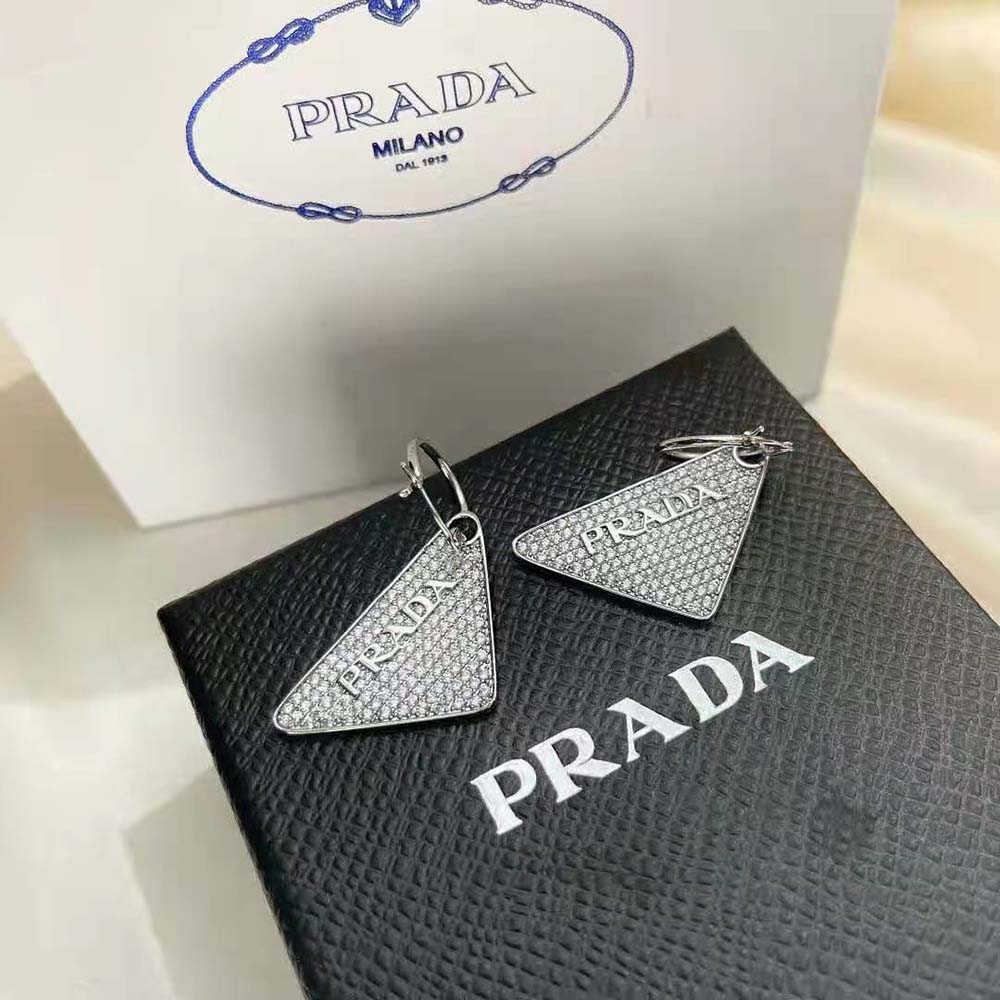 Side angle of Prada Women Crystal Logo Jewels Left Earring silver stud