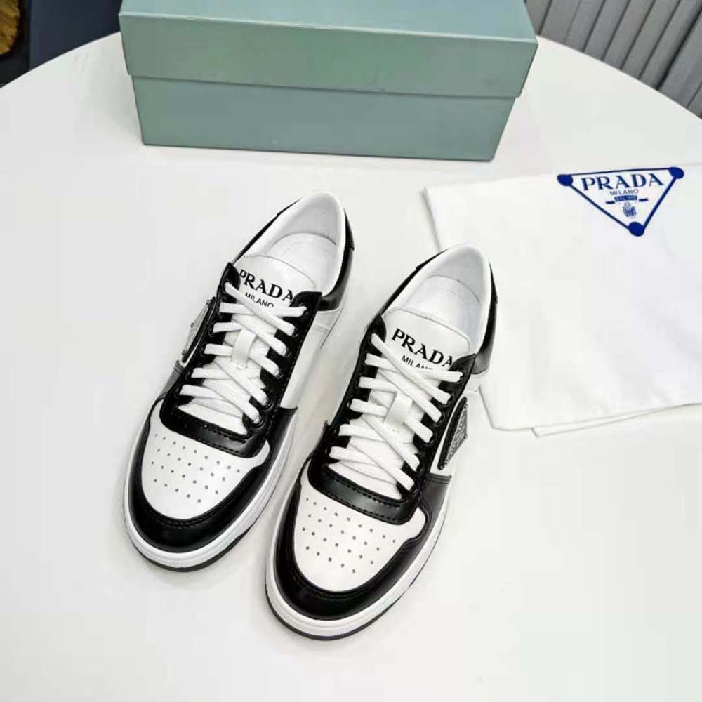 Close-up of white leather and lace detail on Prada Women Downtown Leather Sneakers-White