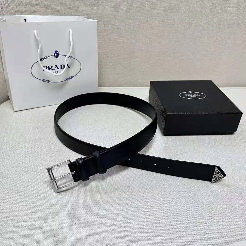 Side angle showing slim silhouette of Prada Women Leather Belt in black