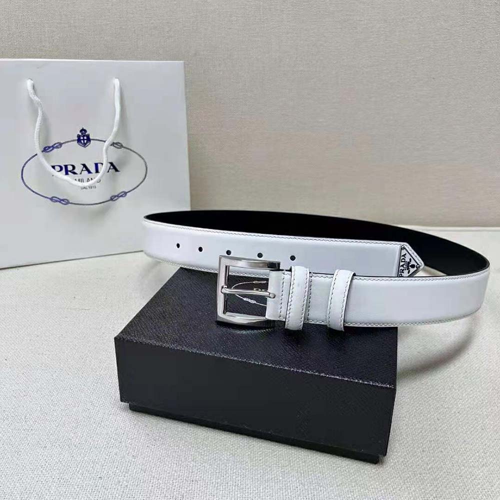 Close-up of enameled-metal triangle logo on Prada Women Leather Belt white