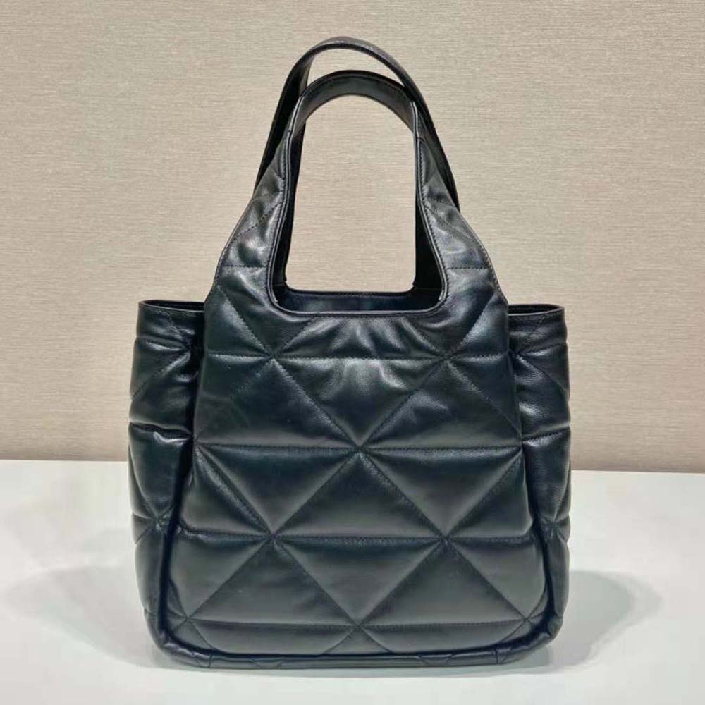 Side angle showing gold-tone hardware on Prada Women Medium Nappa-Leather Tote Bag