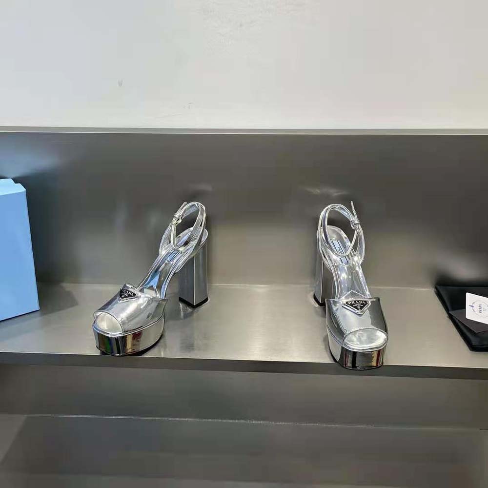 Close-up on silver metallic leather and buckle of Prada Women Metallic Leather Platform Sandals-Silver