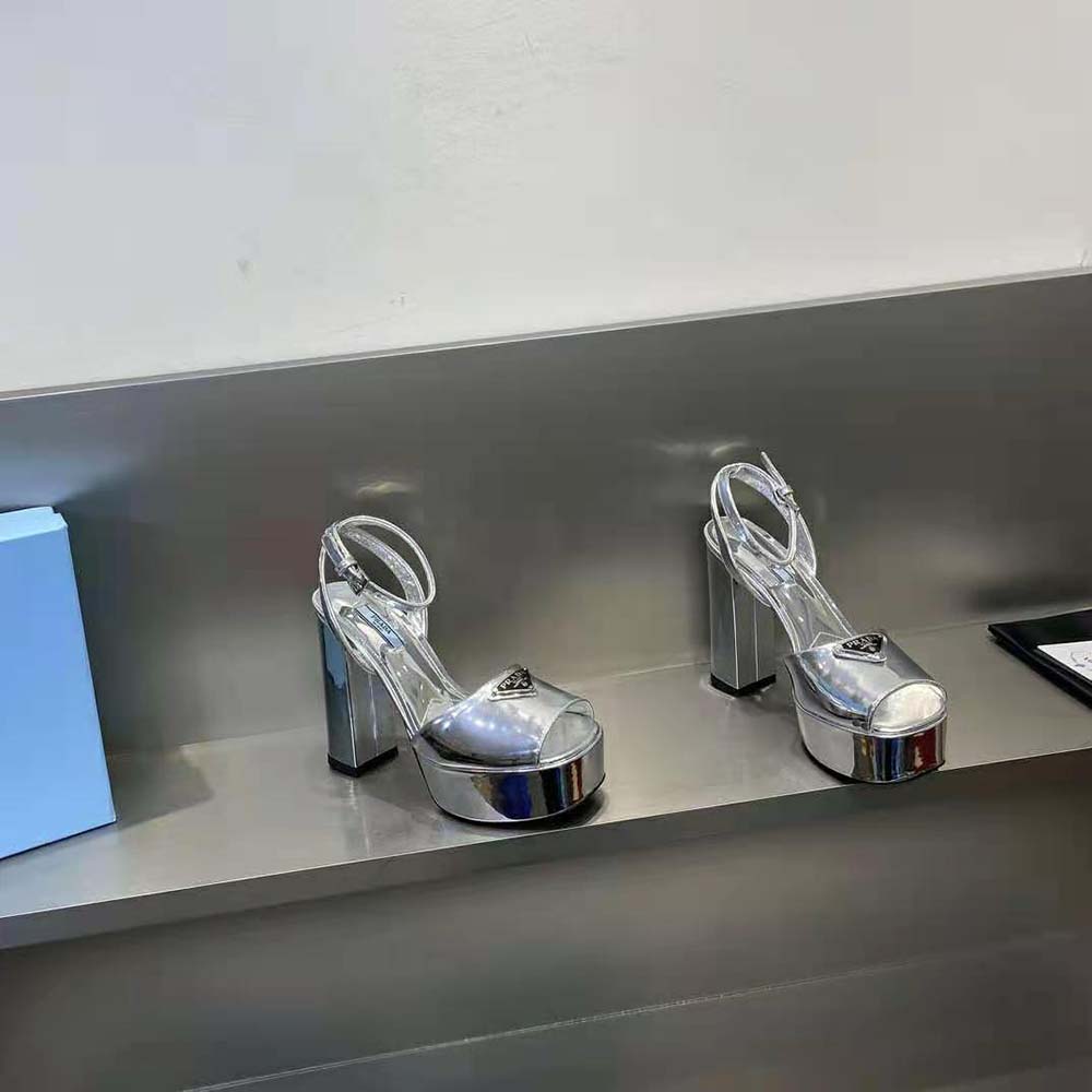 Front angle of Prada Women Metallic Leather Platform Sandals-Silver highlighting platform heel