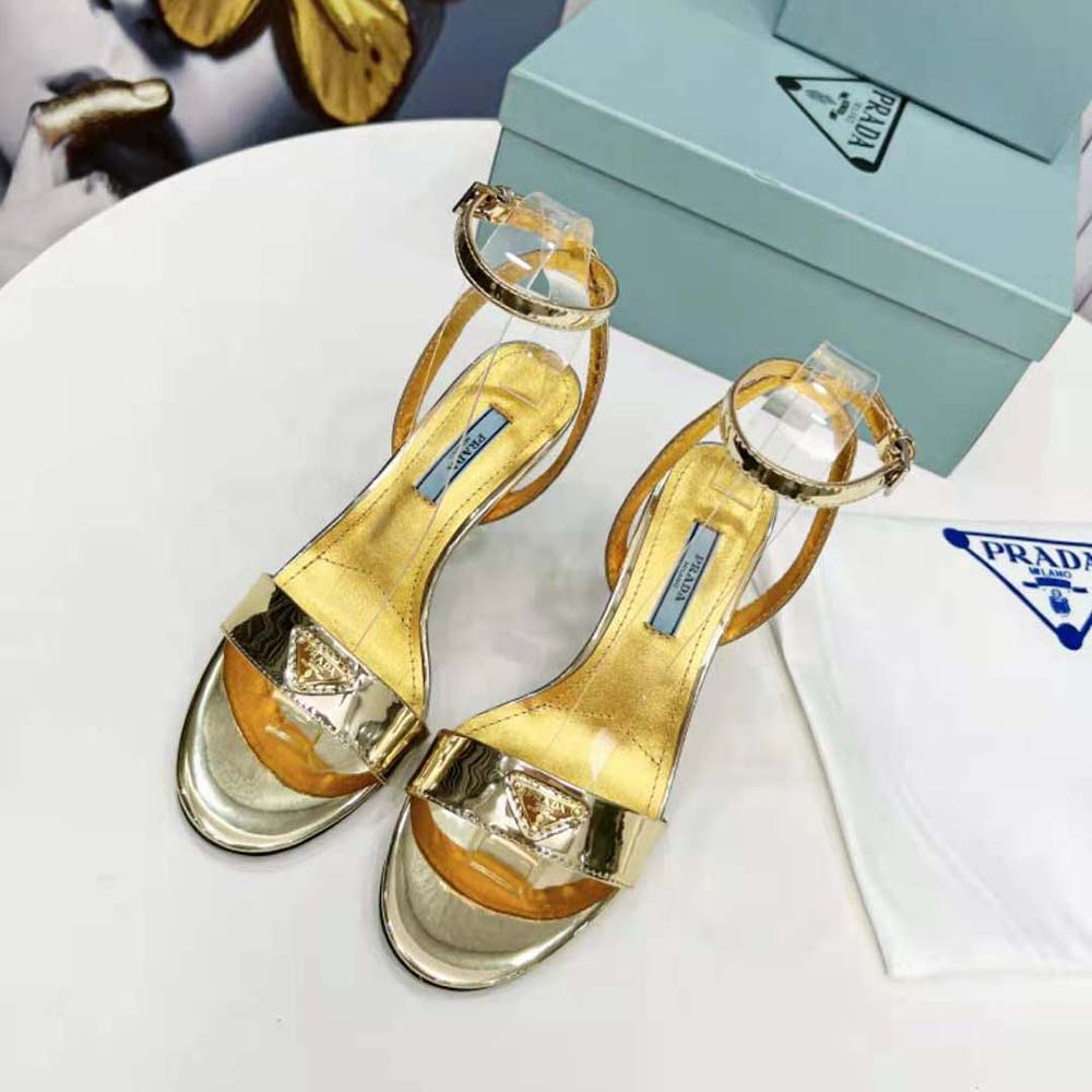 Close-up of buckle and gold-tone hardware on Prada sandals