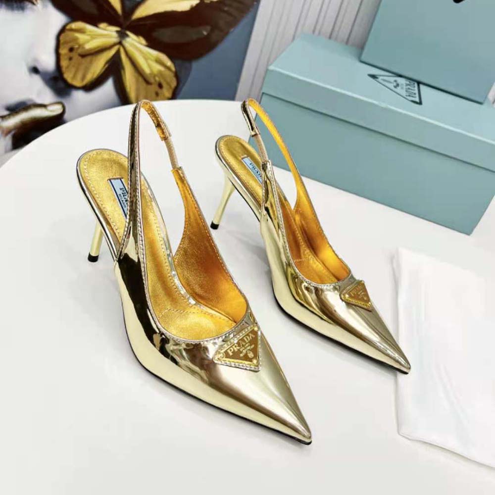 Top angle of pointed toe and metallic leather texture on Prada slingbacks