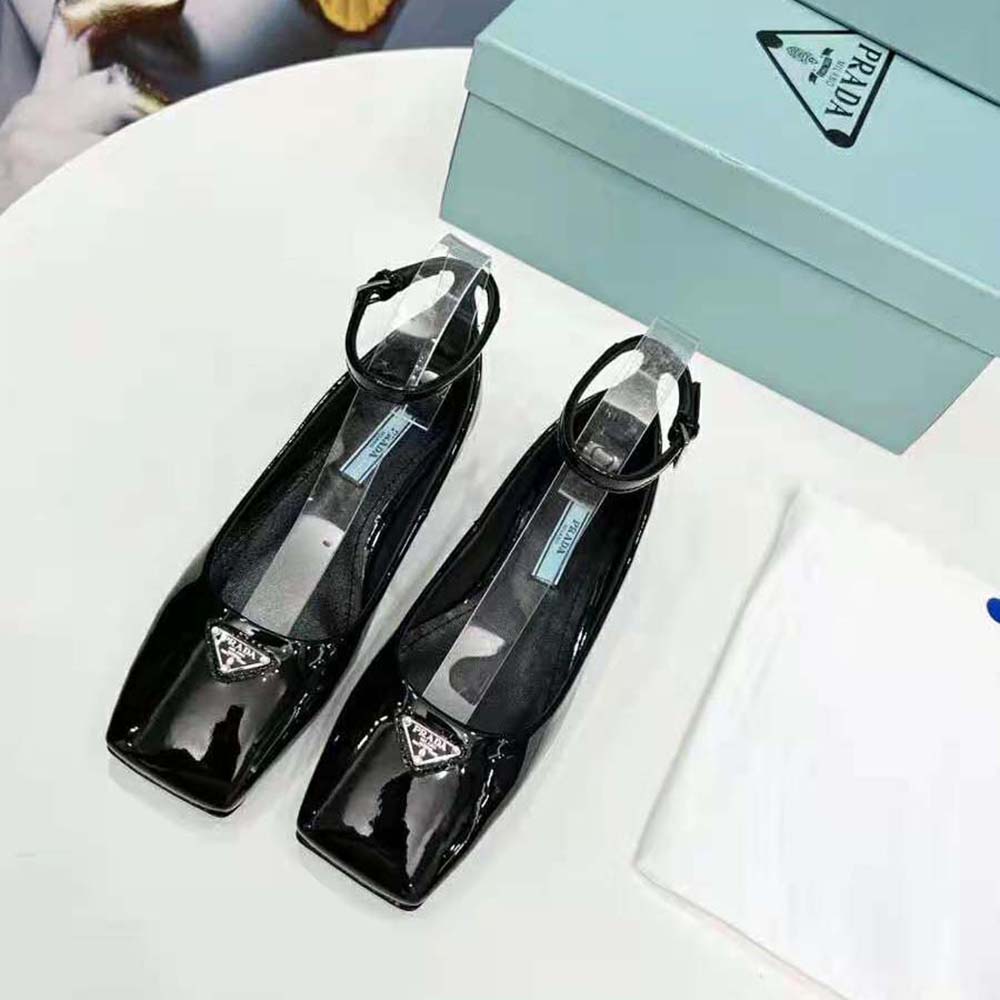 Close-up of subtle Prada logo on Prada Women Patent Leather Ballerinas-Black