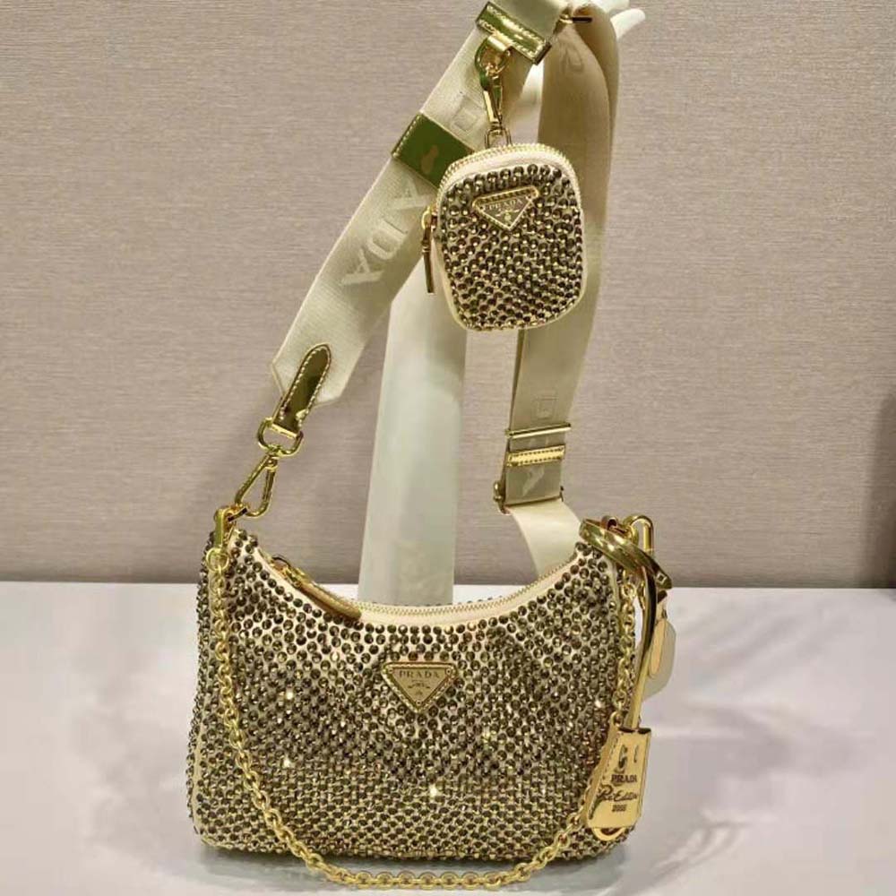 Close-up of crystal-studded logo on Prada Women Re-Edition 2005 Satin Bag with Crystals-Gold