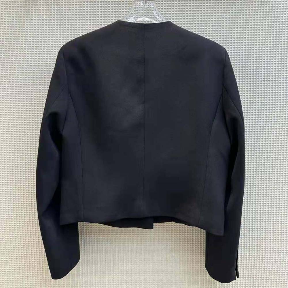 Side angle showing tailored slim silhouette of Prada Women Tricotine Jacket
