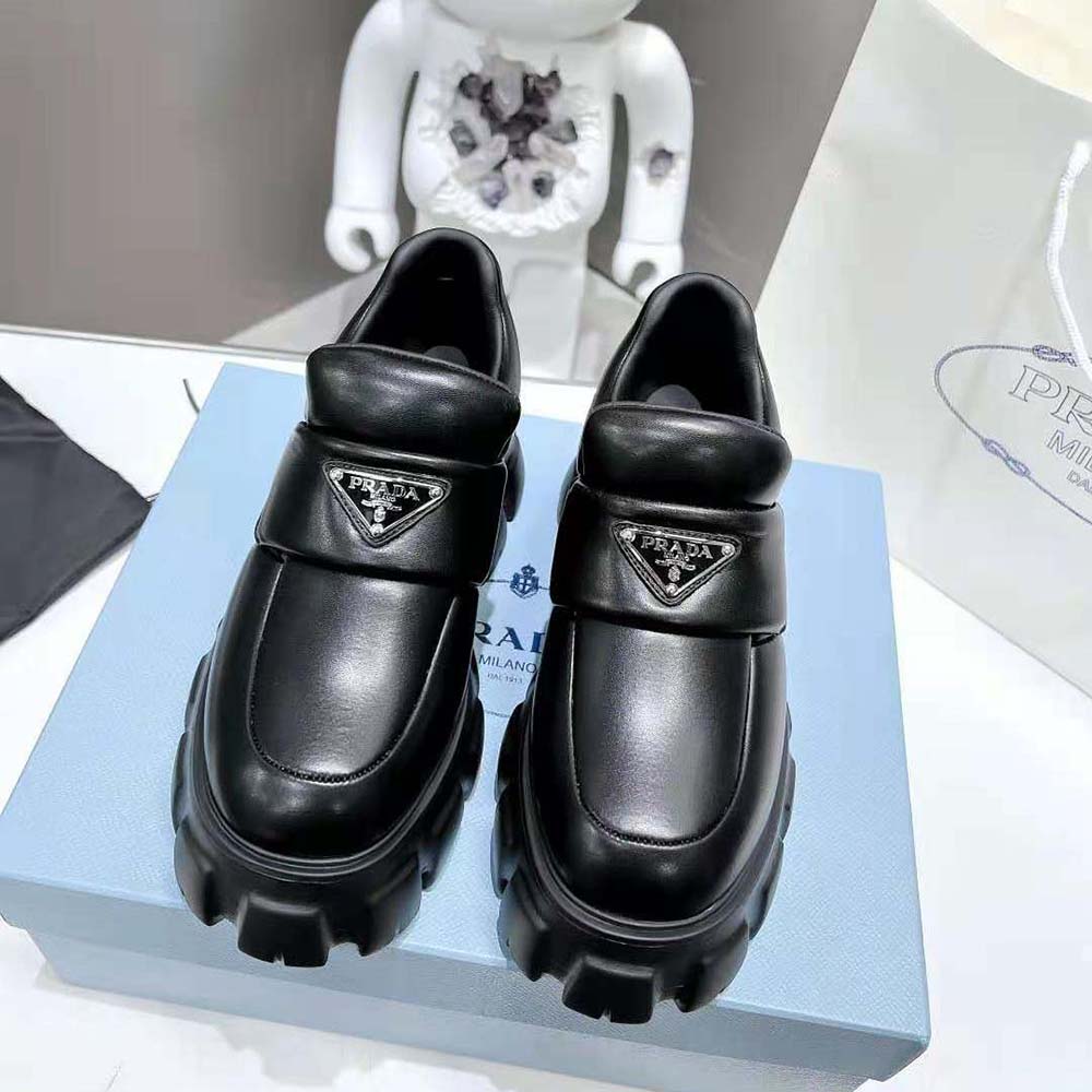 Close-up detail of padded nappa leather on Prada Women Soft Padded Nappa Leather Loafers-Black