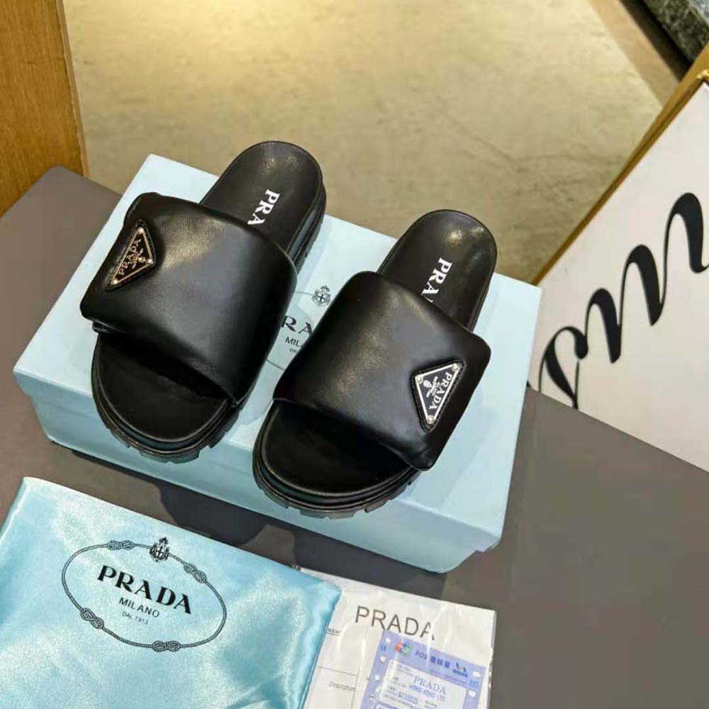 Close-up of padded nappa leather on Prada Women Soft Padded Slides